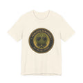 "Pickled & Dangerous" pickleball t-shirt in Natural, front view, badge of a pickleball in sunglasses