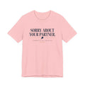 "Sorry About Your Partner." pickleball t-shirt in Pink, front view, paddle icon, "Competitive Doubles"